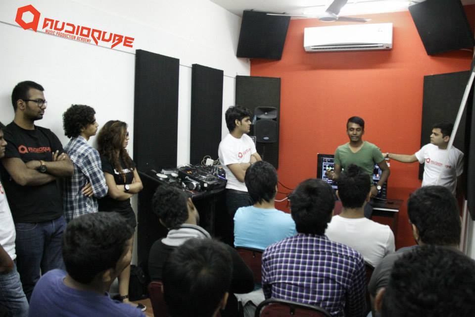 Students gathered around the DJ booth during the DJ Nawed masterclass